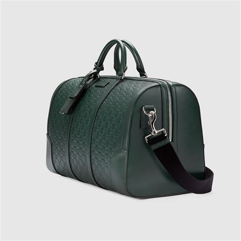 signature leather gucci duffle|Gucci carry on duffle bag.